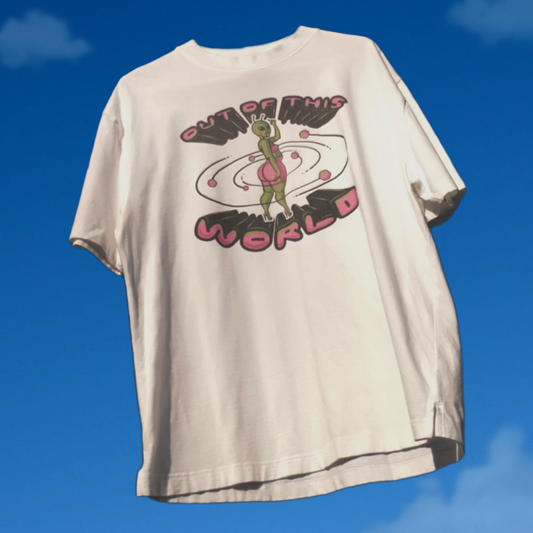 White t-shirt with graphic design on a blue sky background